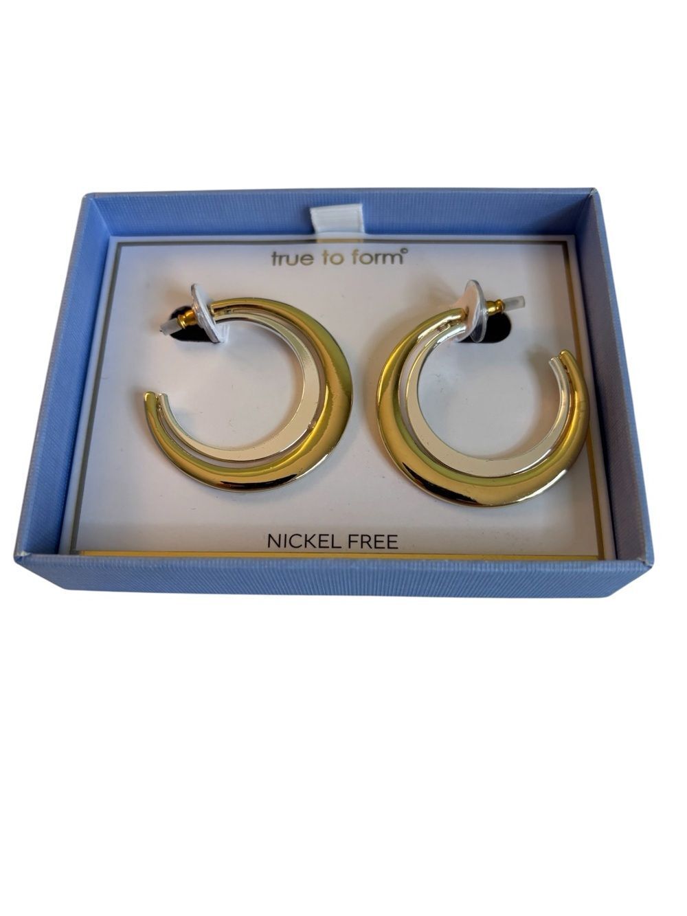 True to Form Two Toned Mixed Metal C-Hoop Earrings.